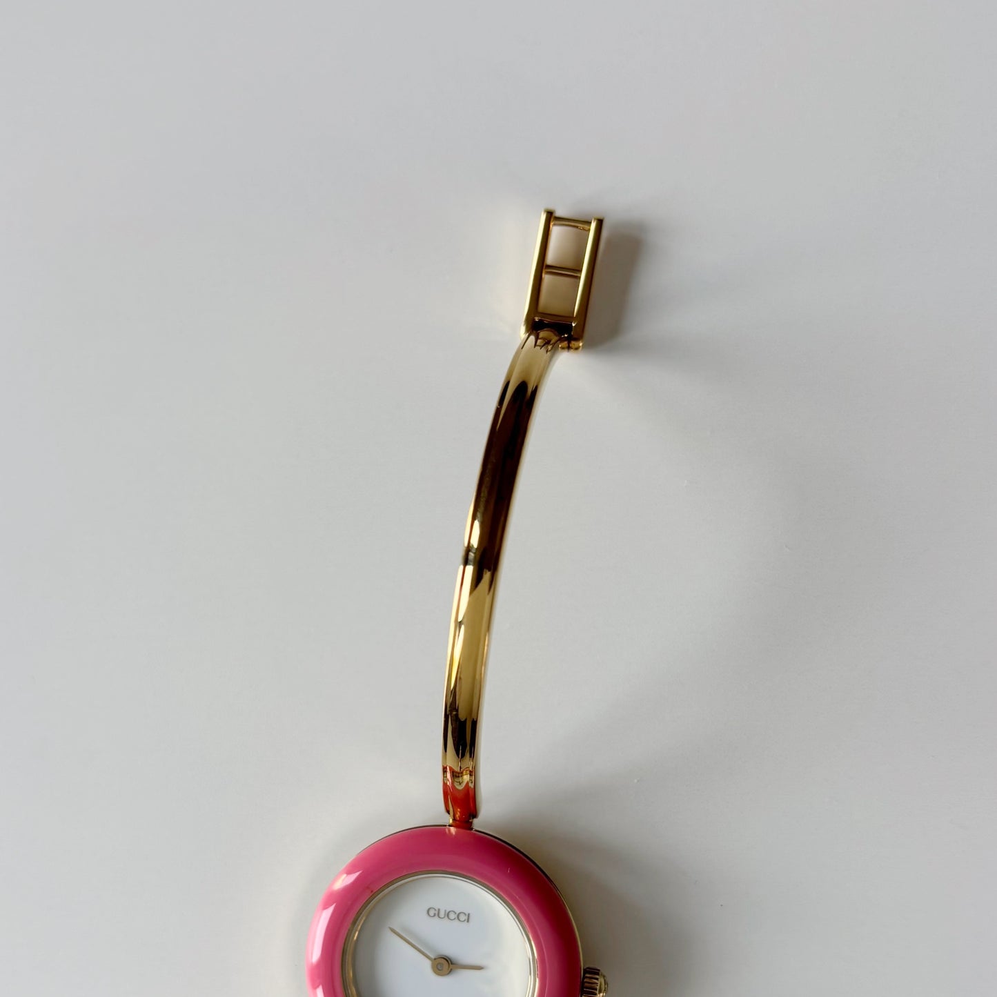 Gucci 1990s Interchangeable Bezel Gold Plated Bangle Watch with case, 12 bezels