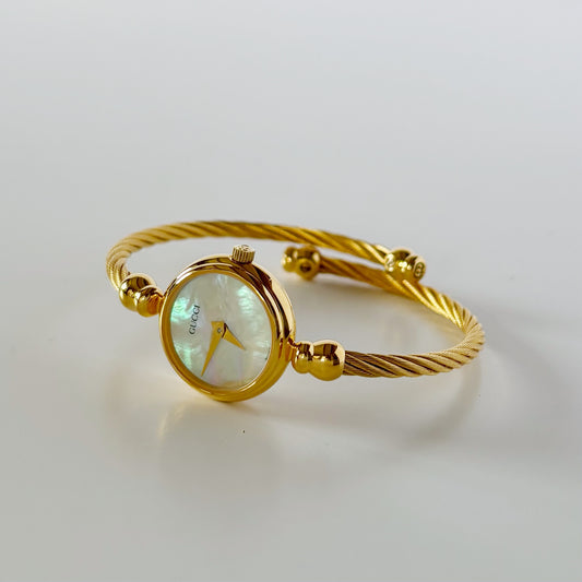 Gucci 1990s Seashell Dial Gold Plated Cable Band Bangle Watch