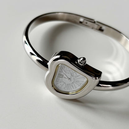 Yves Saint Laurent 1990s Heart Shaped Dial Silver Bangle Watch