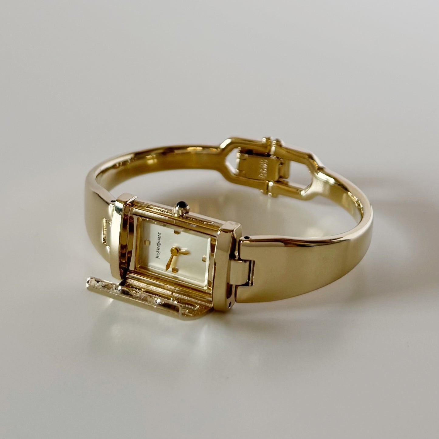 Yves Saint Laurent 1990s Peek a boo Gold Plated Bangle Watch