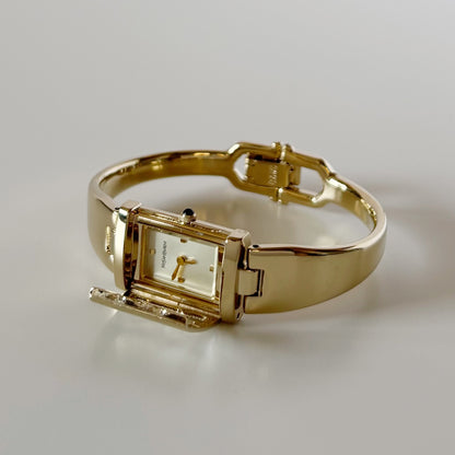 Yves Saint Laurent 1990s Peek a boo Gold Plated Bangle Watch