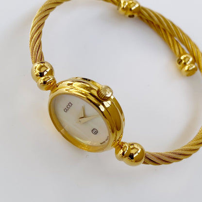 Gucci 1990s Seashell Dial Gold Plated Round Watch