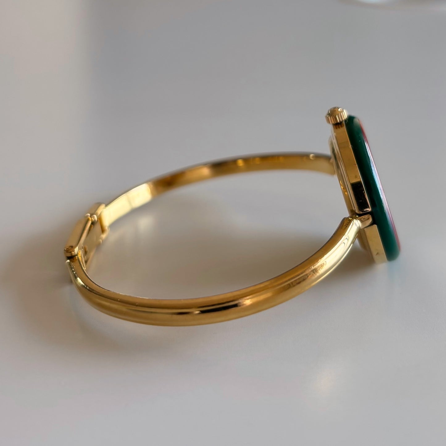 Gucci 1990s Interchangeable Bezel Gold Plated Bangle Watch with 12 bezels, case