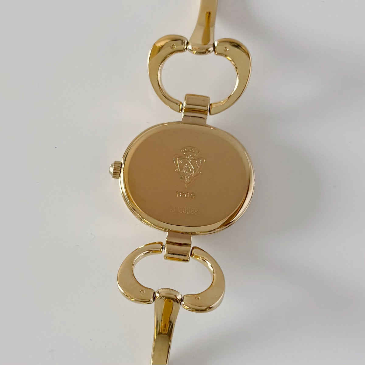 Gucci 1990s Seashell Oval Dial Gold-Plated Bangle Watch (Small)