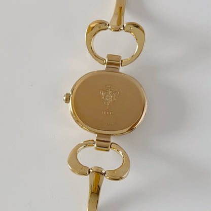 Gucci 1990s Seashell Oval Dial Gold-Plated Bangle Watch (Small)