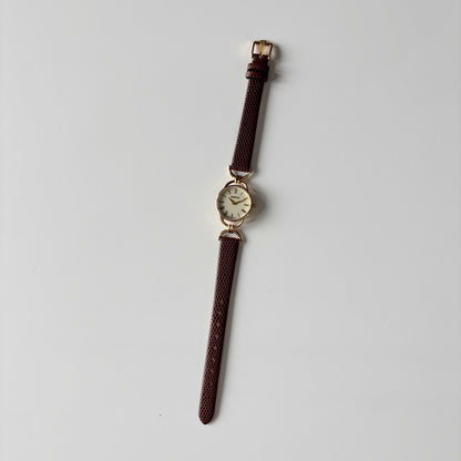 Gucci 1990s Round Dial Horsebit Gold Plated Watch