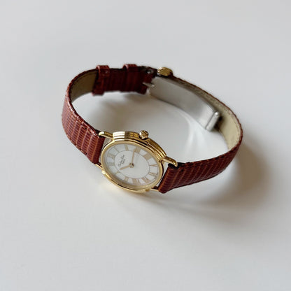 Dior 1990s Seashell Round Dial Gold-Plated Watch