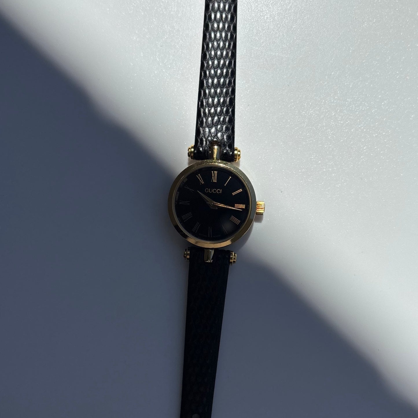 Gucci 1990s Black Round Dial Gold Plated Watch