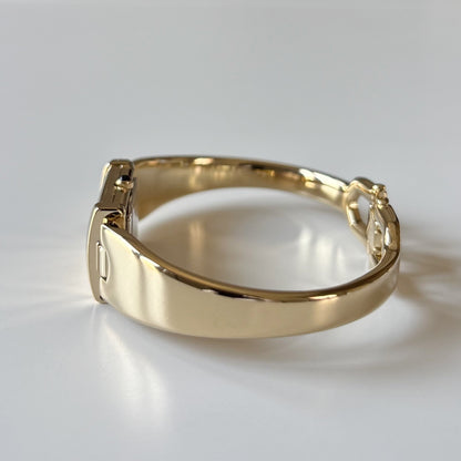 Yves Saint Laurent 1990s Peek a boo Gold Plated Bangle Watch