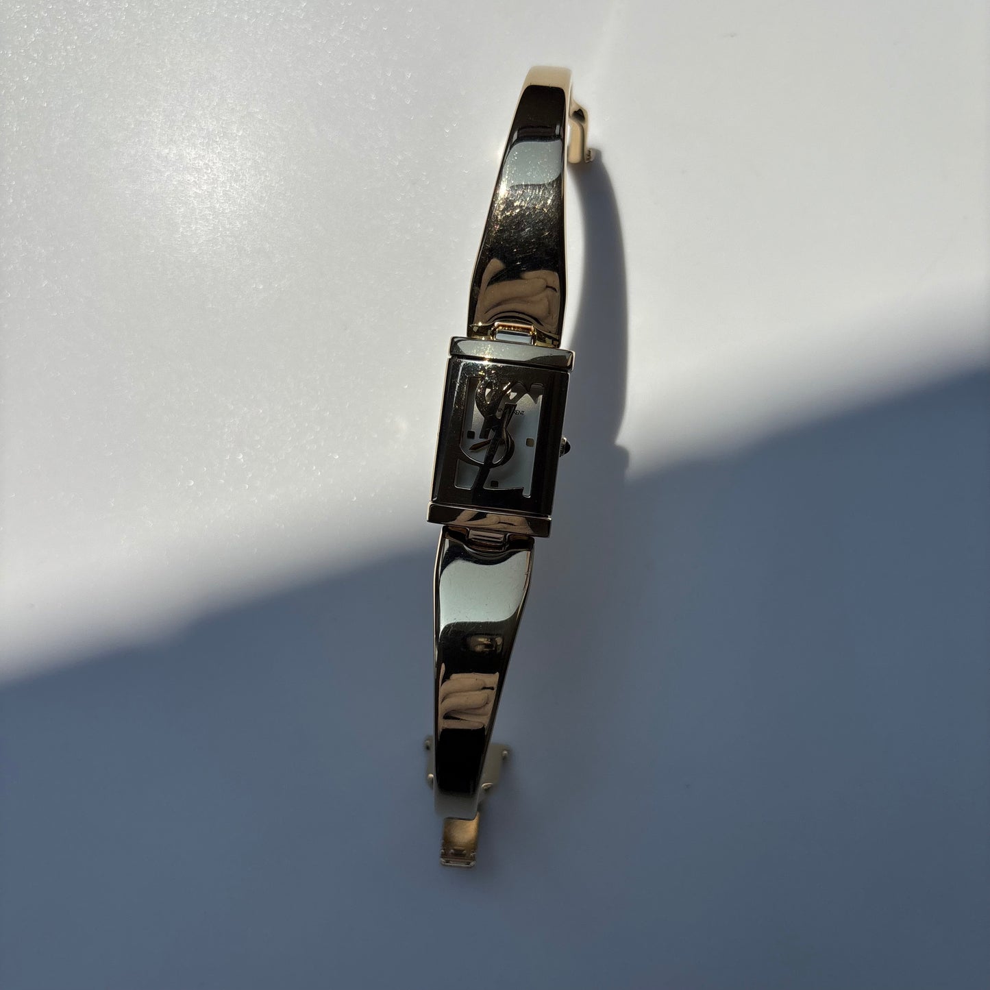Yves Saint Laurent 1990s Peek a boo Gold Plated Bangle Watch