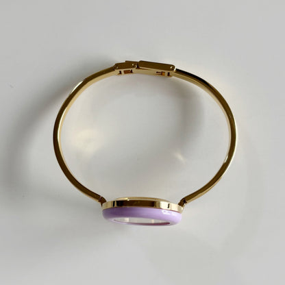 Gucci 1990s Interchangeable Bezel Gold Plated Bangle Watch with 12 bezels, case