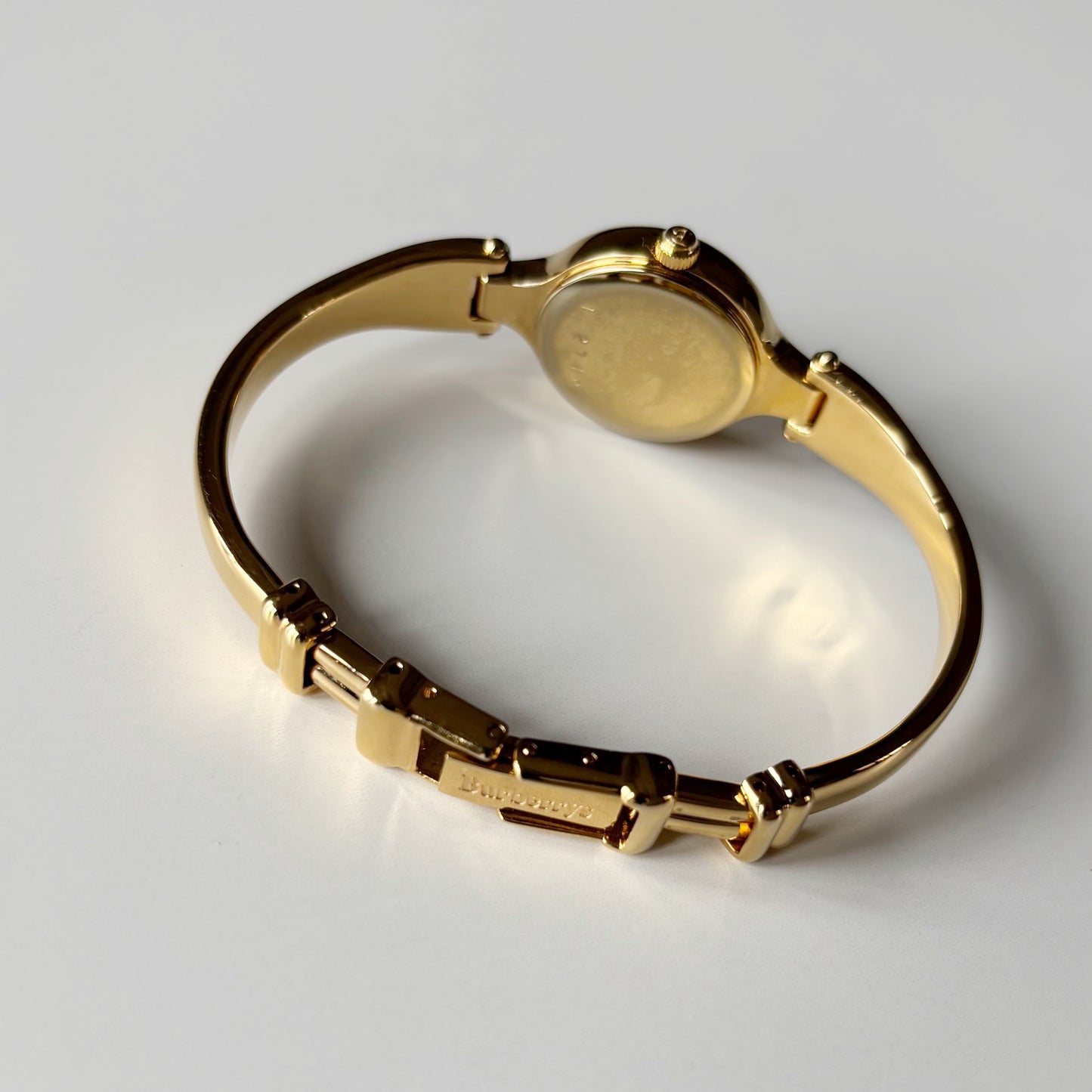Burberry 1990s Round Dial Gold Plated Bangle Watch