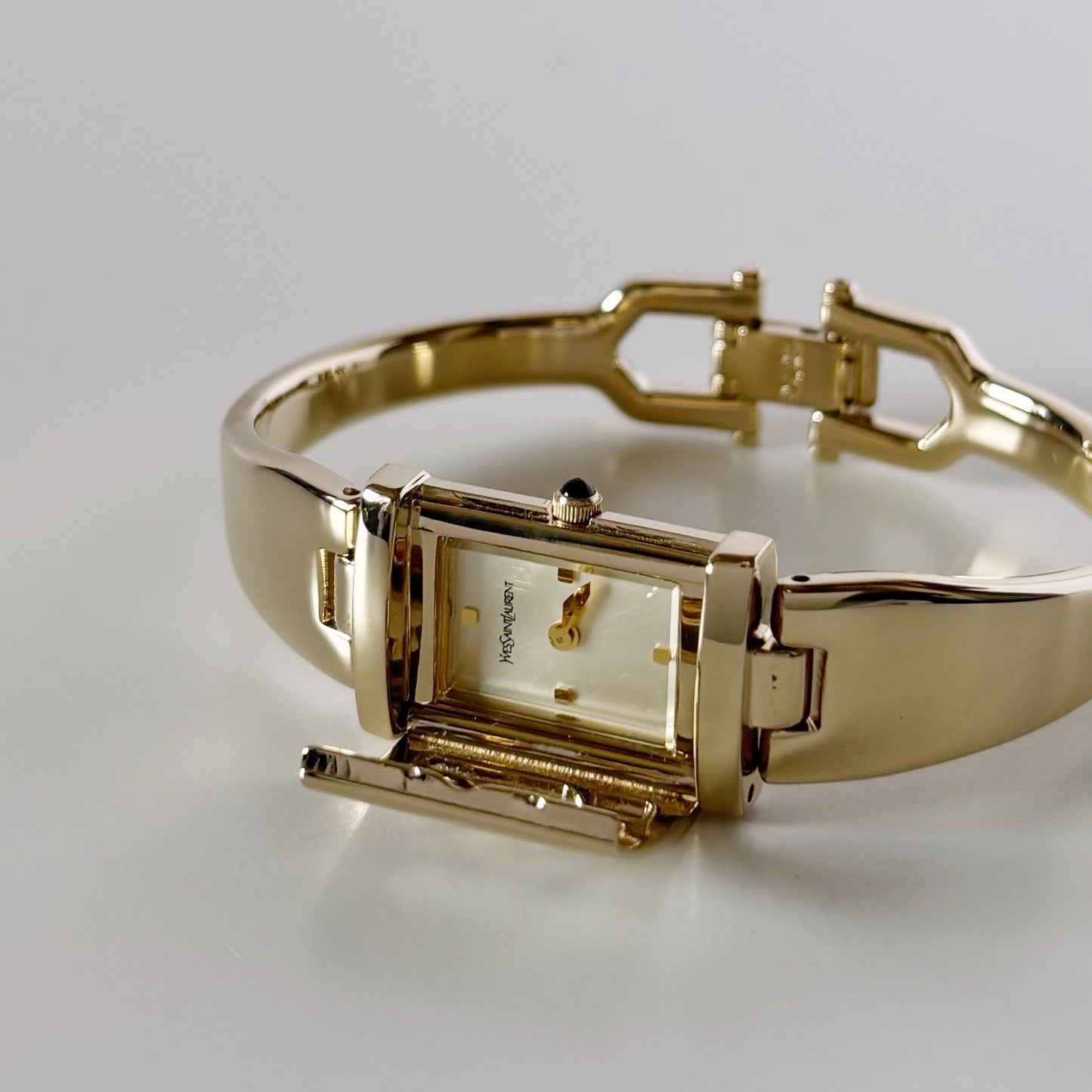Yves Saint Laurent 1990s Peek-A-Boo Gold Plated Bangle Watch