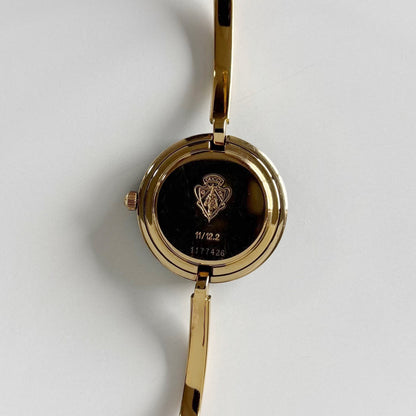 Gucci 1990s Interchangeable Bezel Gold Plated Bangle Watch with 12 bezels, case