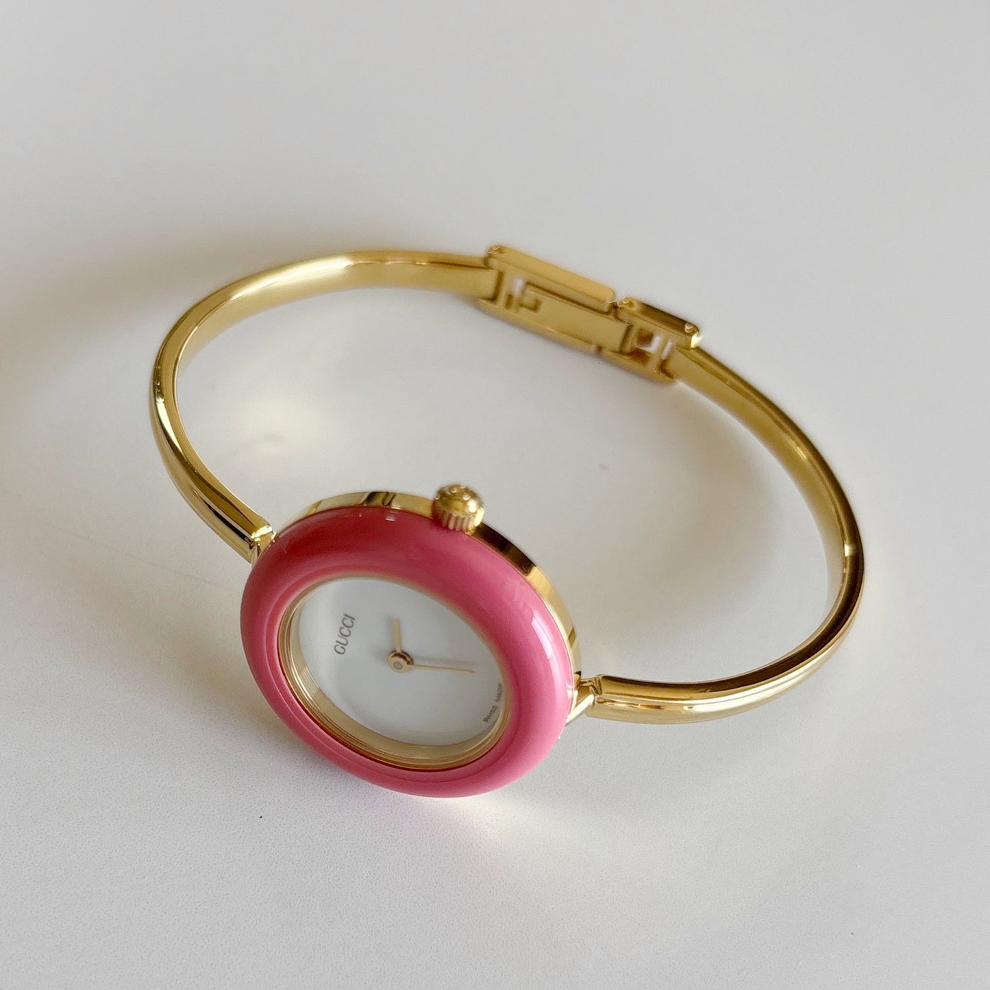 Gucci 1990s Interchangeable Bezel Gold Plated Bangle Watch with 12 bezels, case