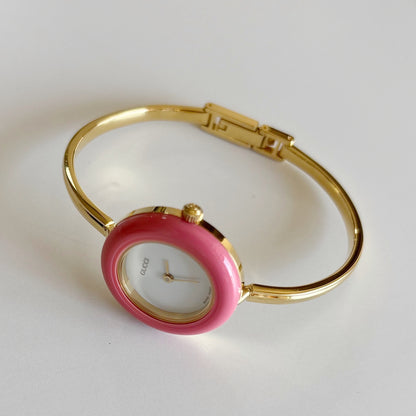 Gucci 1990s Interchangeable Bezel Gold Plated Bangle Watch with 12 bezels, case