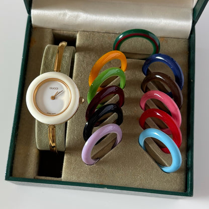 Gucci 1990s Interchangeable Bezel Gold Plated Bangle Watch with 12 bezels, case