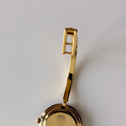 Gucci 1990s Interchangeable Bezel Gold Plated Bangle Watch with 12 bezels, case