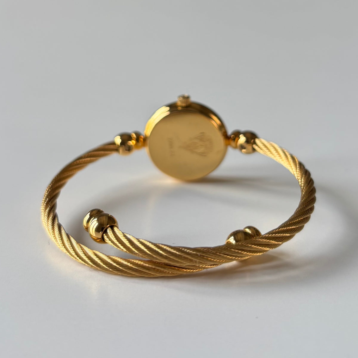 Gucci 1990s Seashell Dial Gold Plated Cable Bangle Watch