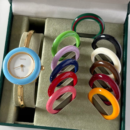 Gucci 1990s Interchangeable Bezel Gold Plated Bangle Watch with 12 bezels, case