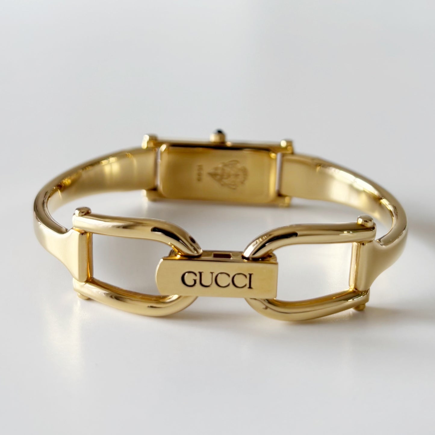 Gucci 1990s Rectangular Black Dial Gold Plated Bangle Watch