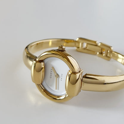 Gucci 1990s Round Dial Gold Plated Bangle Watch