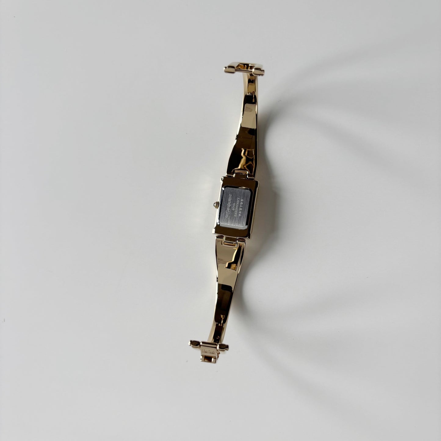 Yves Saint Laurent 1990s Peek-A-Boo Gold Plated Bangle Watch