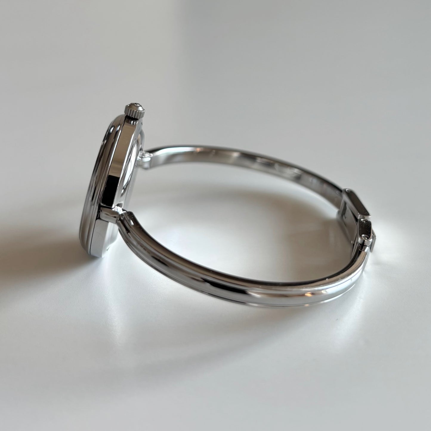 Gucci 1990s Interchangeable Bezel Stainless steel Bangle Watch with 12 bezels, case (Small)