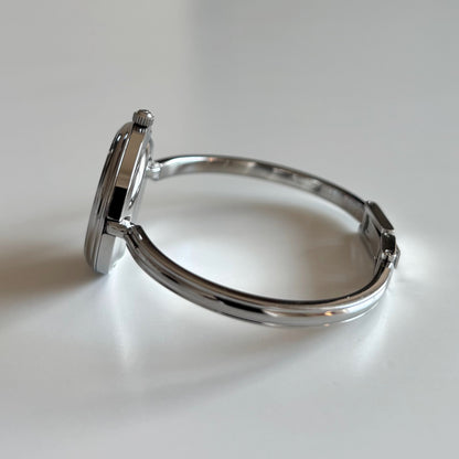 Gucci 1990s Interchangeable Bezel Stainless steel Bangle Watch with 12 bezels, case (Small)