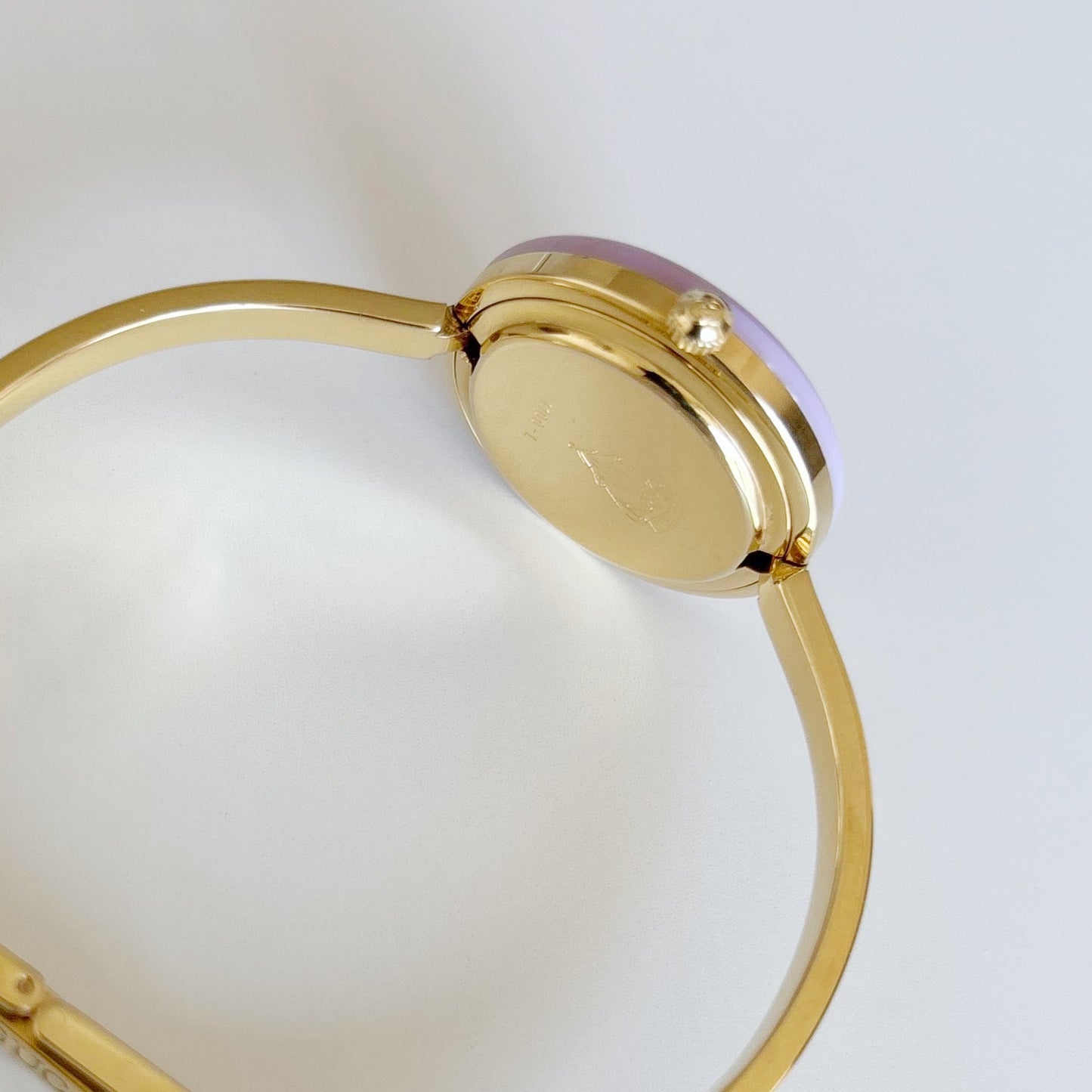 Gucci 1990s Interchangeable Bezel Gold Plated Bangle Watch with 12 bezels, case