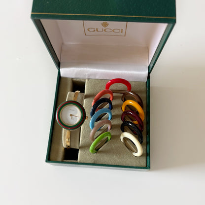 Gucci 1990s Interchangeable Bezel Gold Plated Bangle Watch with 12 bezels, case (Small)