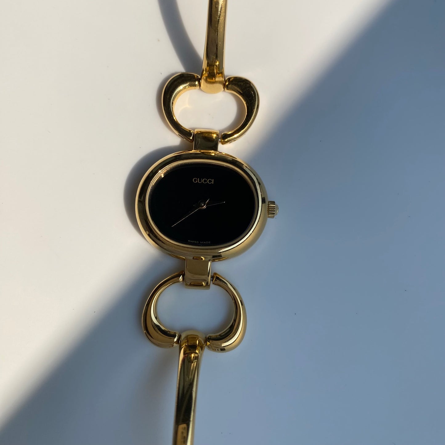 Gucci 1990s Black Dial Gold Plated Bangle Watch