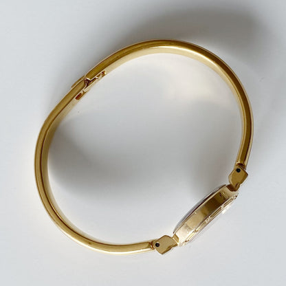 Yves Saint Laurent 1990s Seashell Dial Gold Plated Bangle Watch