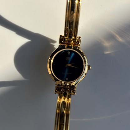 Givenchy 1990s Navy Round Dial Gold Plated Bangle Watch