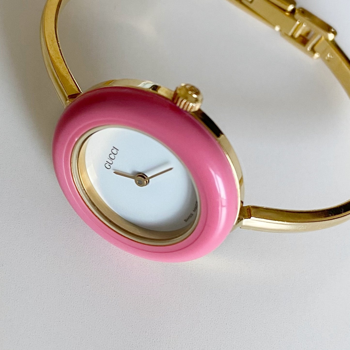 Gucci 1990s Interchangeable Bezel Gold Plated Bangle Watch with 12 bezels, case (Small)