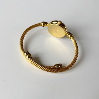 Gucci 1990s Black Round Dial Cable Gold Plated Bangle Watch