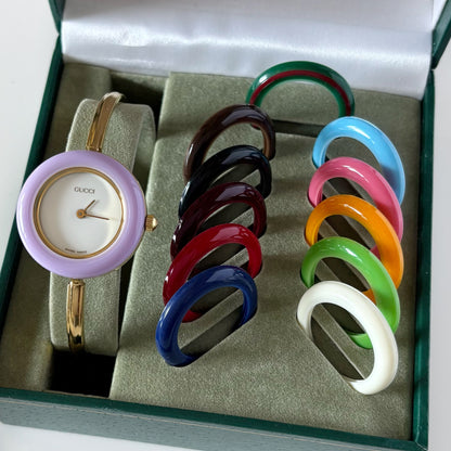 Gucci 1990s Interchangeable Bezel Gold Plated Bangle Watch with 12 bezels, case