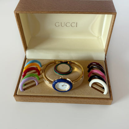 Gucci 1990s Interchangeable Bezel Gold Plated Bangle Watch with 12 bezels, case (Small)