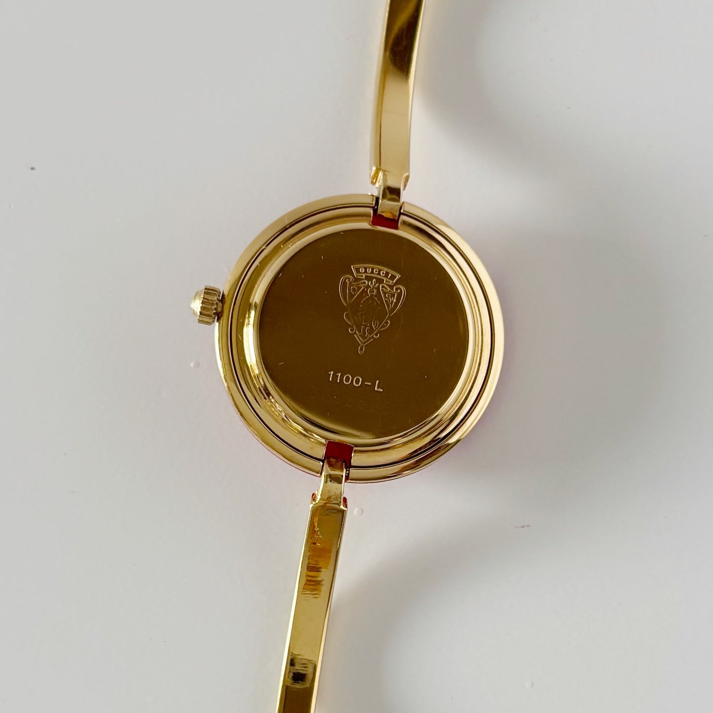 Gucci 1990s Interchangeable Bezel Gold Plated Bangle Watch with 12 bezels, case