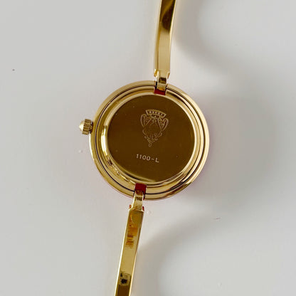 Gucci 1990s Interchangeable Bezel Gold Plated Bangle Watch with 12 bezels, case