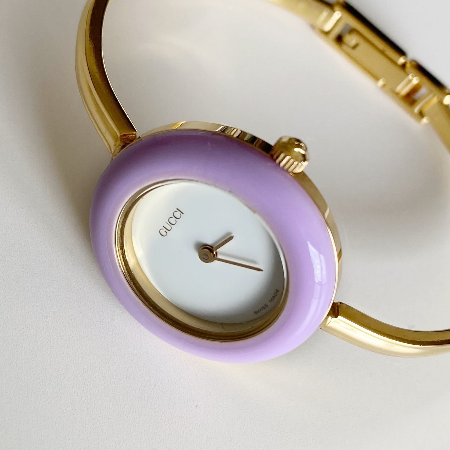 Gucci 1990s Interchangeable Bezel Gold Plated Bangle Watch with 12 bezels, case