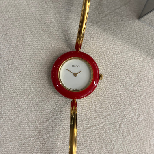 Gucci 1990s Interchangeable Bezel Gold Plated Bangle Watch with 12 bezels, case