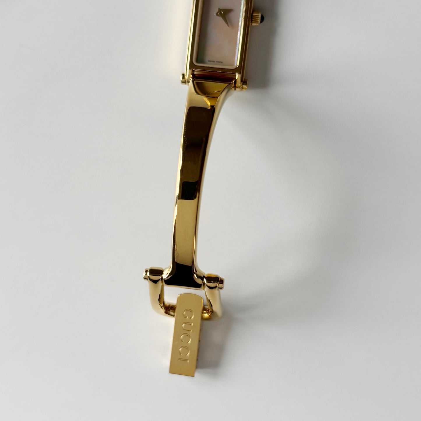 Gucci 1990s Seashell Rectangular Dial Gold Plated Bangle Watch