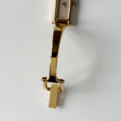 Gucci 1990s Seashell Rectangular Dial Gold Plated Bangle Watch
