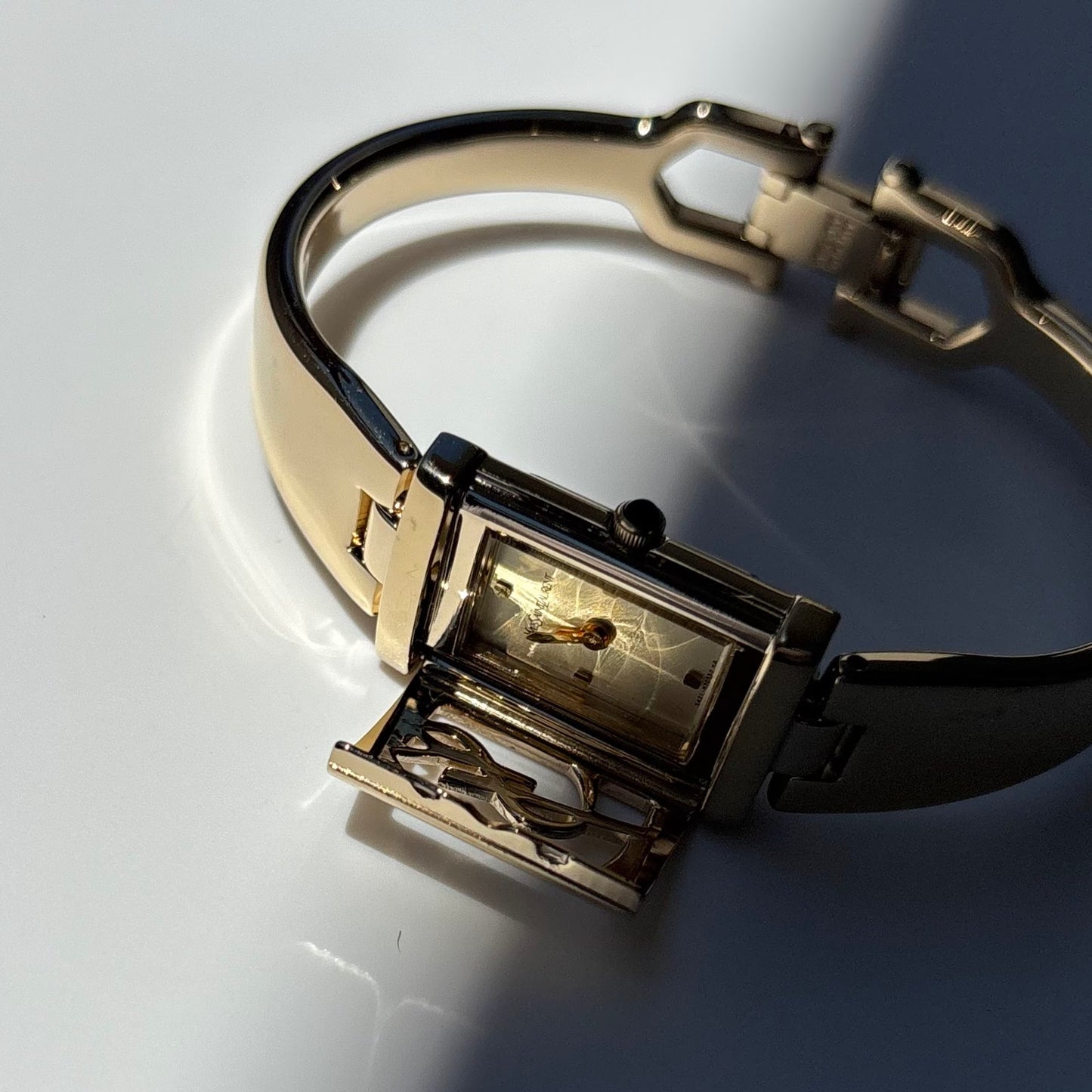Yves Saint Laurent 1990s Peek-A-Boo Gold Plated Bangle Watch