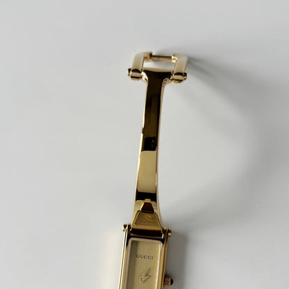 Gucci 1990s Gold Rectangular Dial Gold Plated Bangle Watch