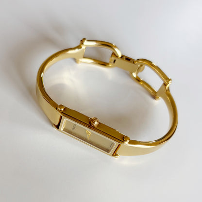 Gucci 1990s Gold Dial Rectangular Gold Plated Bangle Watch
