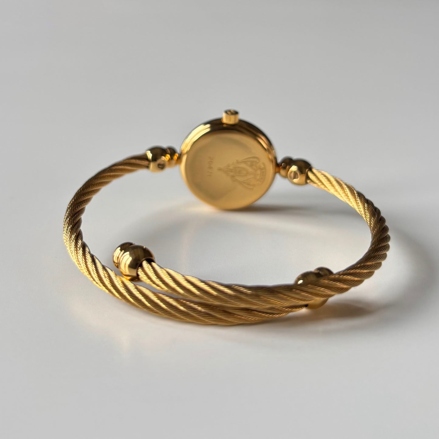 Gucci 1980s Round Dial Cable Band Bangle Watch