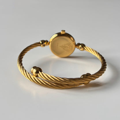 Gucci 1980s Round Dial Cable Band Bangle Watch