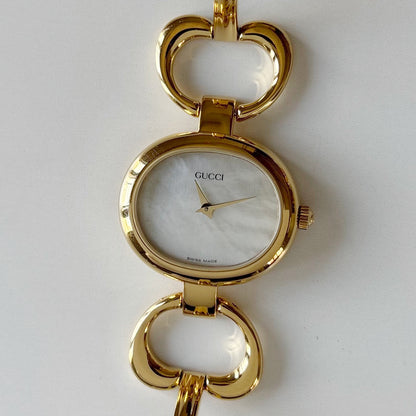 Gucci 1990s Seashell Oval Dial Gold Plated Bangle Watch (Small)
